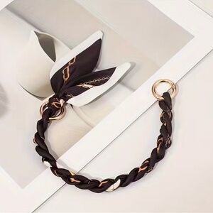 A104. Black and Gold Braided Phone Lanyard Wristlet